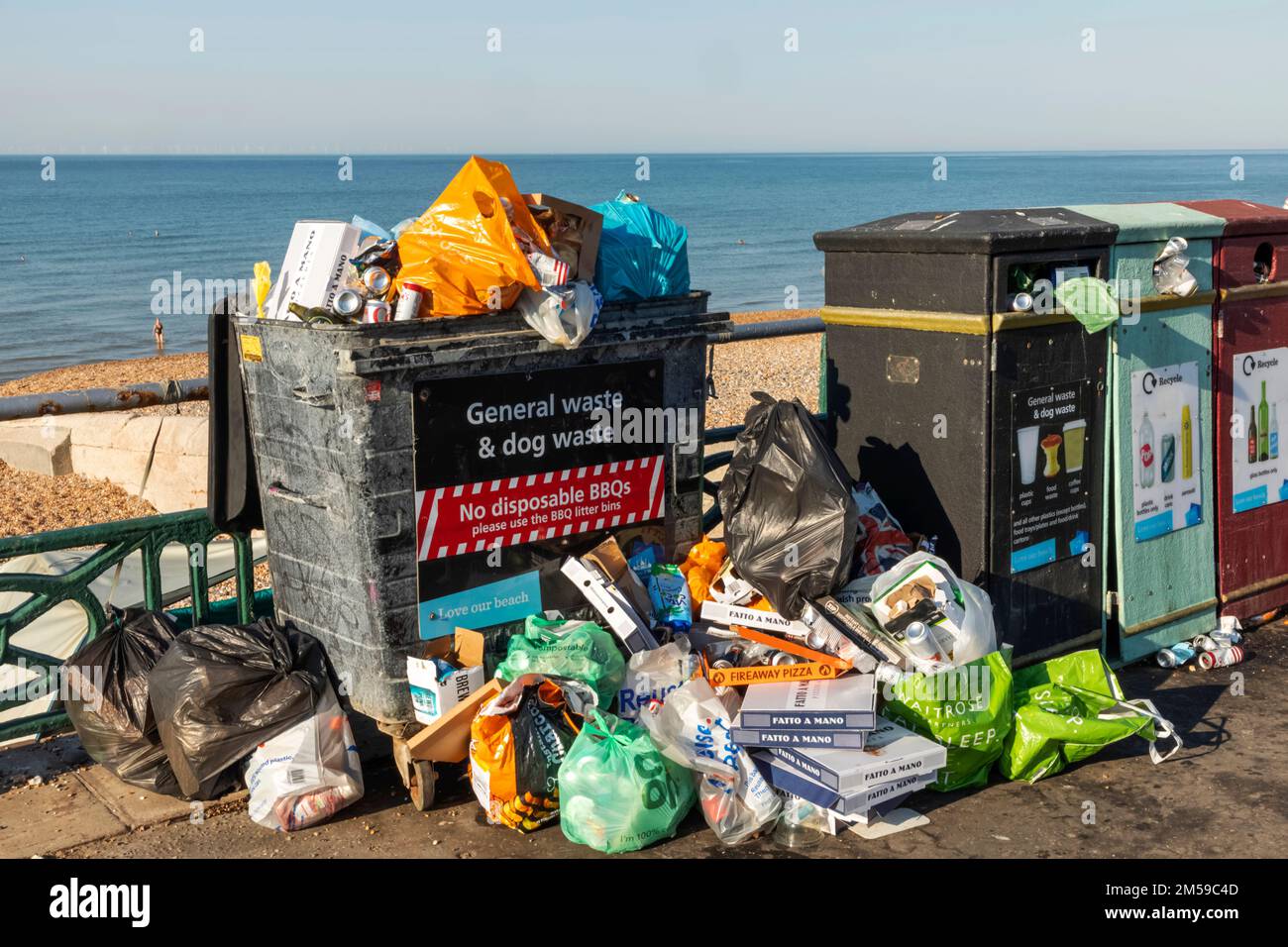 England, East Sussex, Brighton, Brighton Beach, Overflowing Rubbish Bins *** Local Caption ***  UK,United Kingdom,Great Britain,Britain,England,Englis Stock Photo