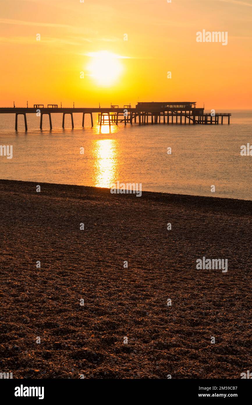 England, Kent, Deal, Sunrise over Deal Pier *** Local Caption ***  Beach,Beaches,Britain,British,Calm,Channel,Coast,Coastal,Dawn,Deal,Deal Pier,Englan Stock Photo