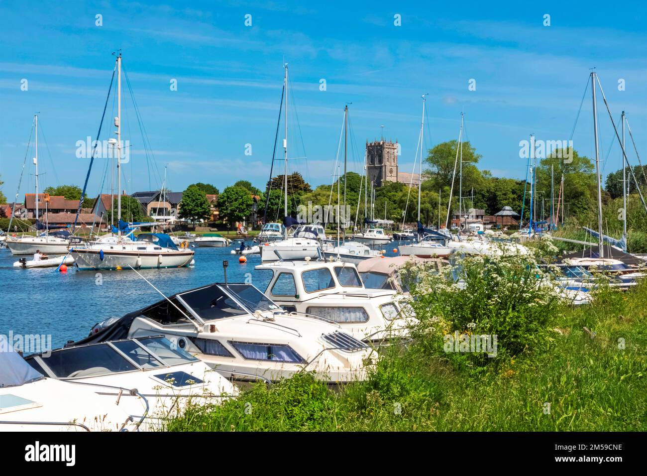 England, Dorset, Christchurch, Yachts on The River Stour and Christchurch Priory *** Local Caption ***  UK,United Kingdom,Great Britain,Britain,Englan Stock Photo