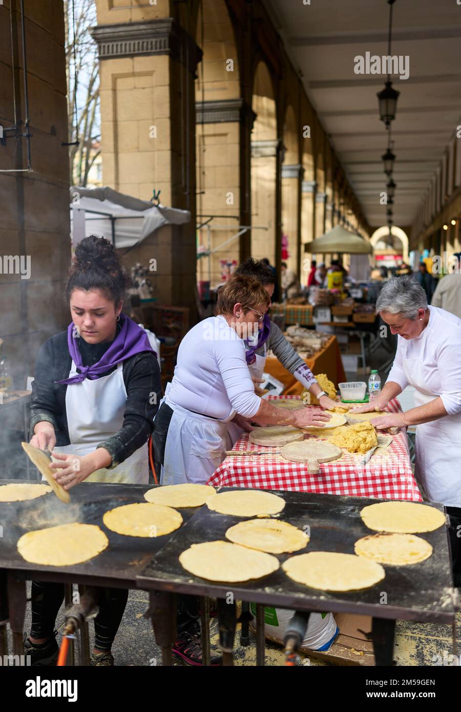 Basque farmers making Talos (basque tortilla) in the Santo Tomas Fair, on Saint Thomas's day. Stock Photo