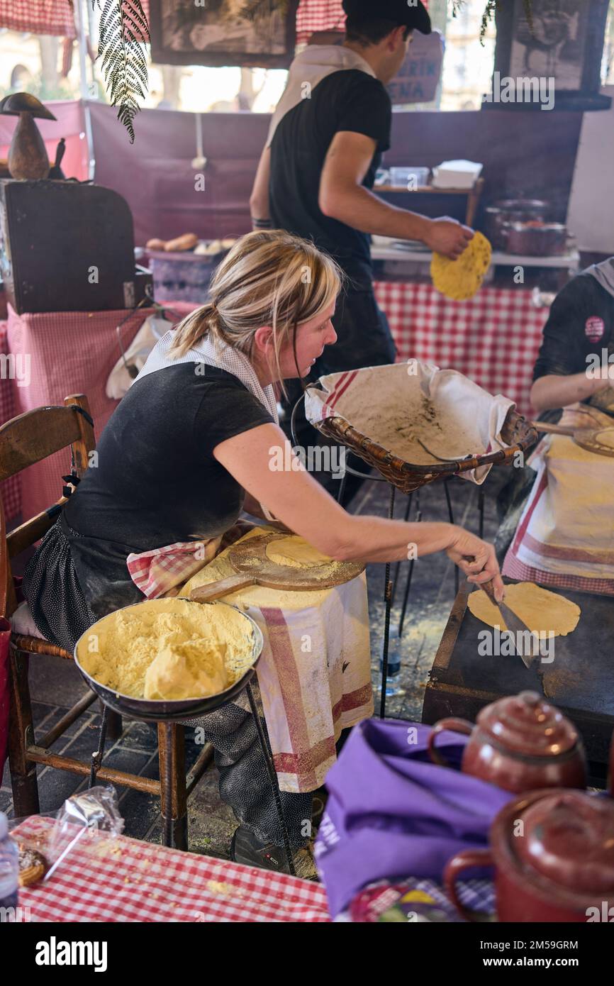 Basque farmers making Talos (basque tortilla) in the Santo Tomas Fair, on Saint Thomas's day. Stock Photo