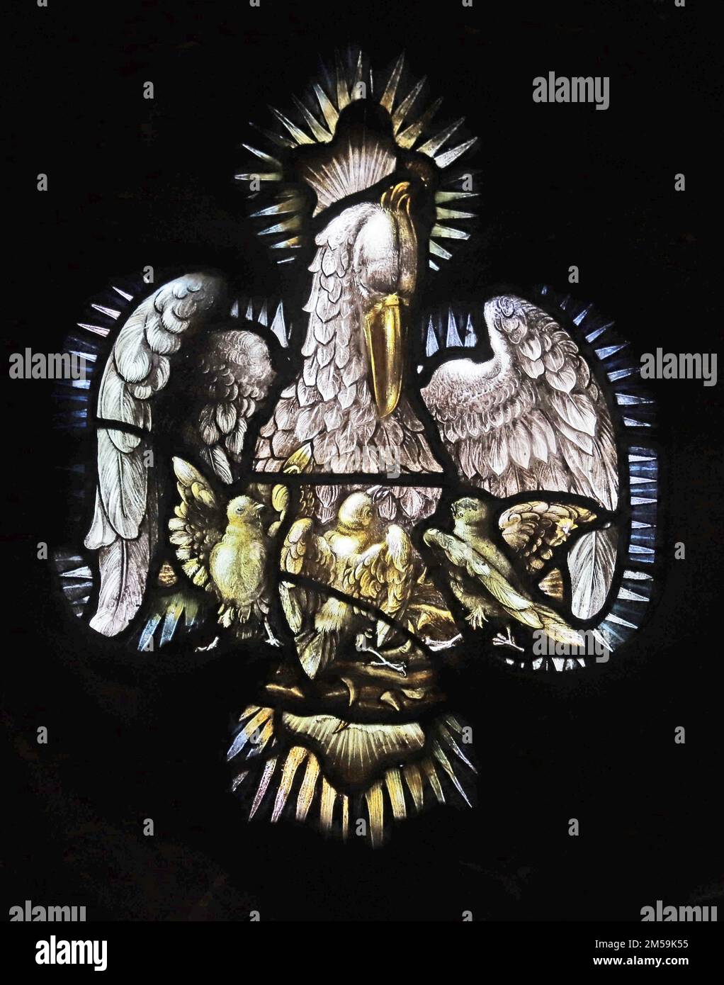Stained glass window by Percy Bacon & Brothers depicting The Pelican in its Piety, St Chard's Church, Bensham, Gateshead Stock Photo