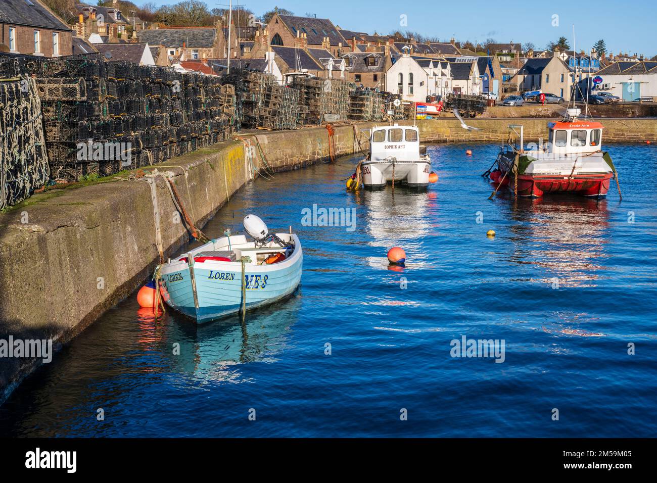Fishing boats in Johnshaven harbour on North Sea coast of Aberdeenshire
