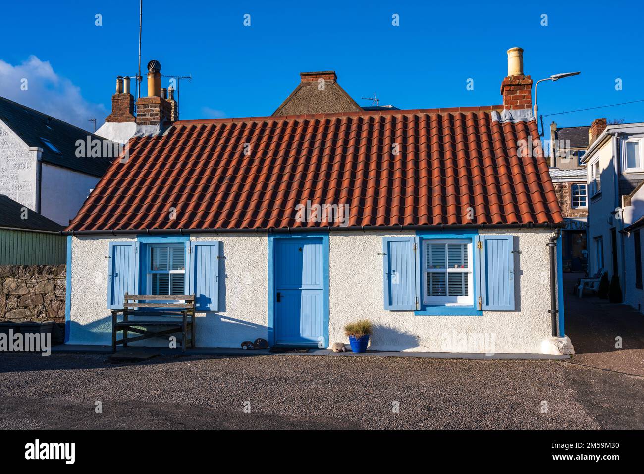 Colourful harbour front cottage in coastal village of Johnshaven on