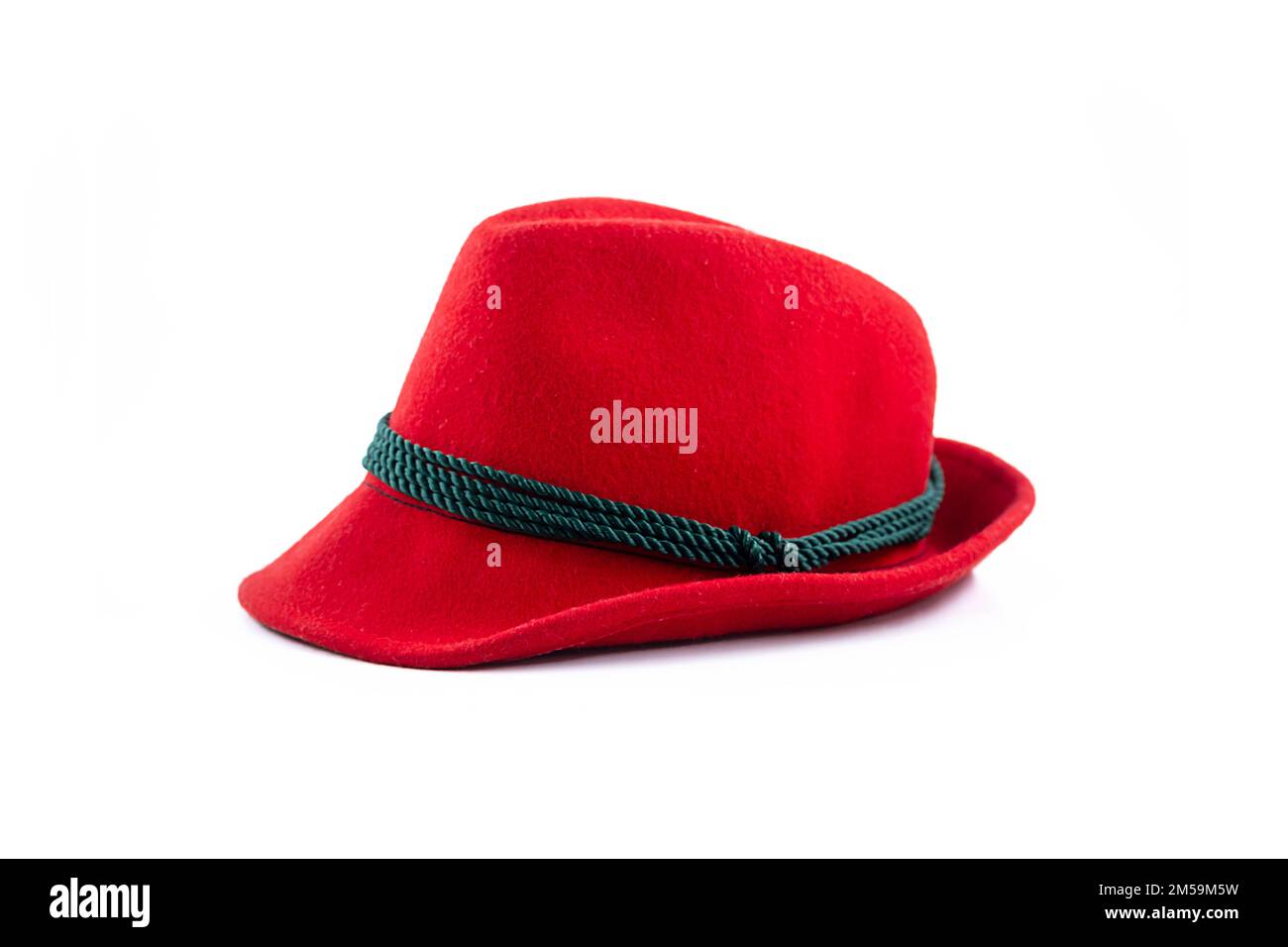 Felt Tyrolean hat on white. Ocktoberfest Bavarian red hat. Stock Photo