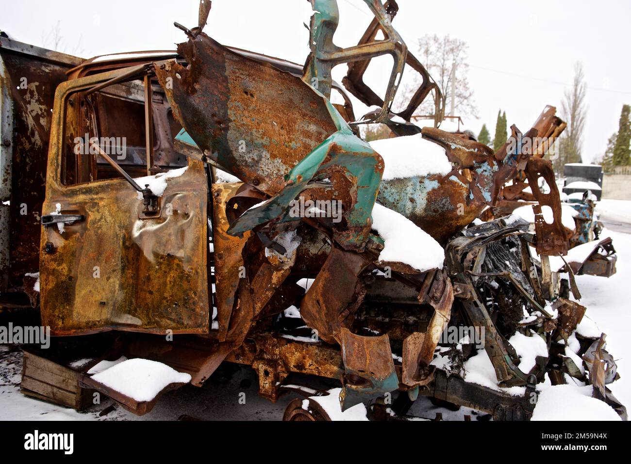 blown-up cars of energy workers in Chernihiv Stock Photo