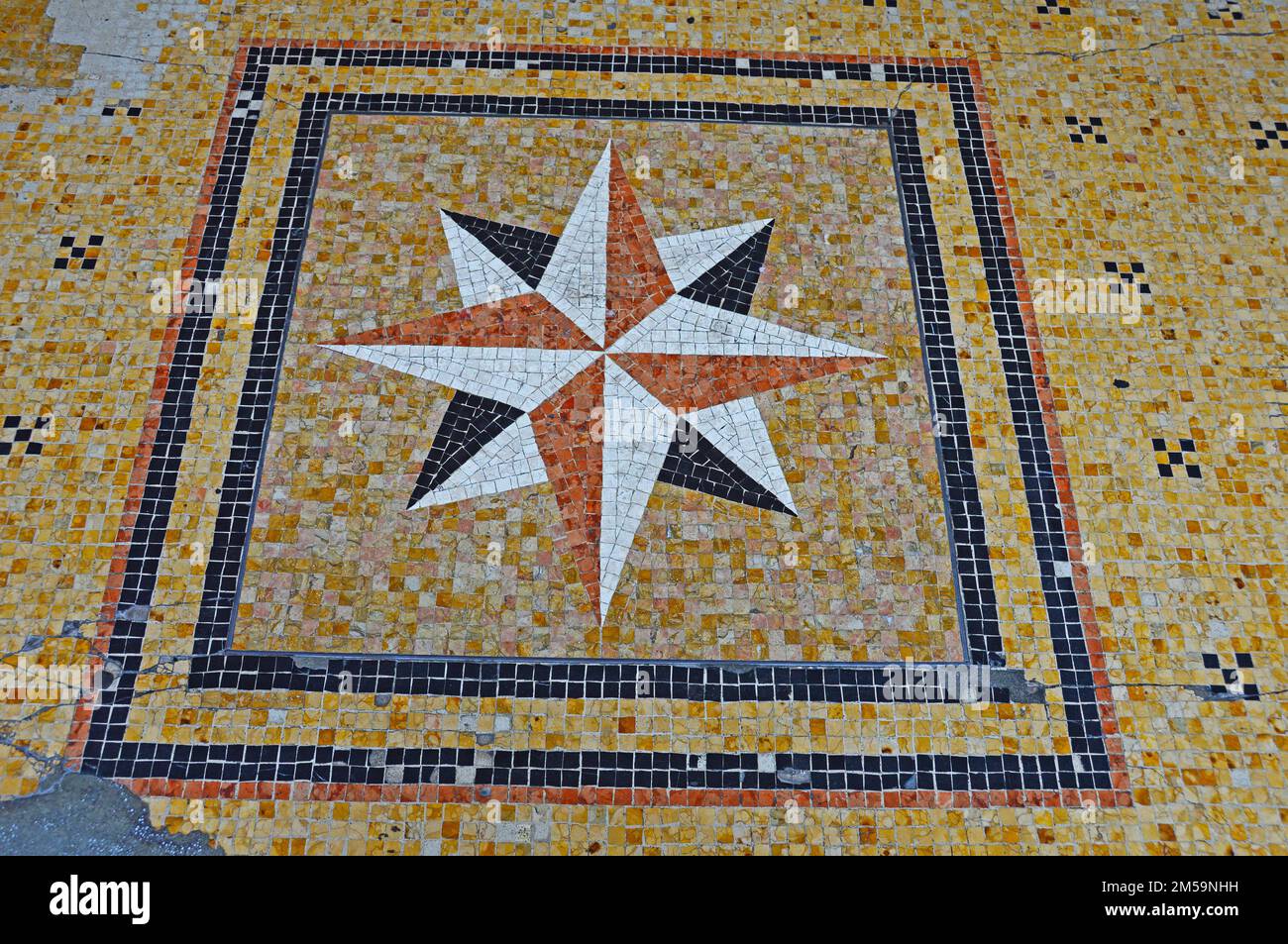 A fragment of the sidewalk on Ugo Bassi Street in Bologna, Italy Stock Photo