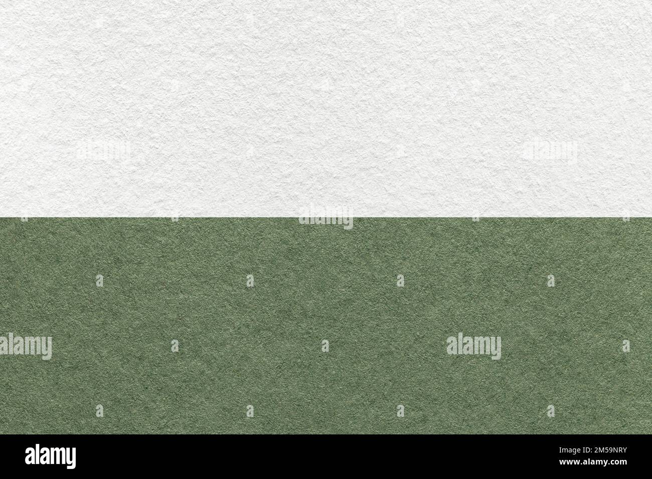 Texture of craft white and green paper background, half two colors