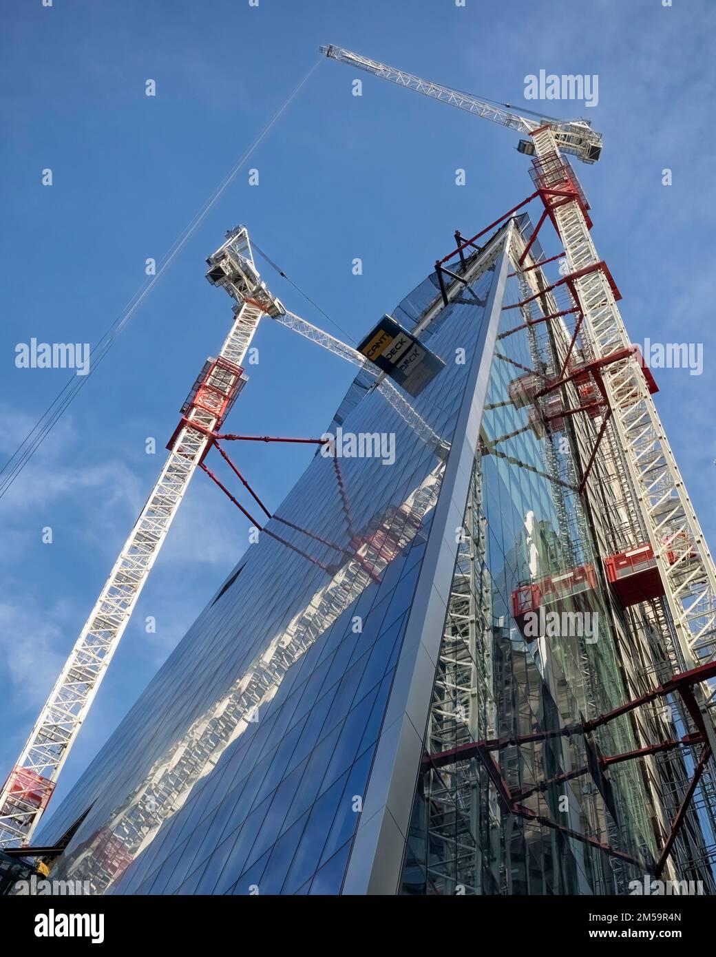 LONDON, UK - AUGUST 25, 2017:  Cranes  on Building Under Construction at 52 Lime Street.  Building also known as the Scalpel Stock Photo