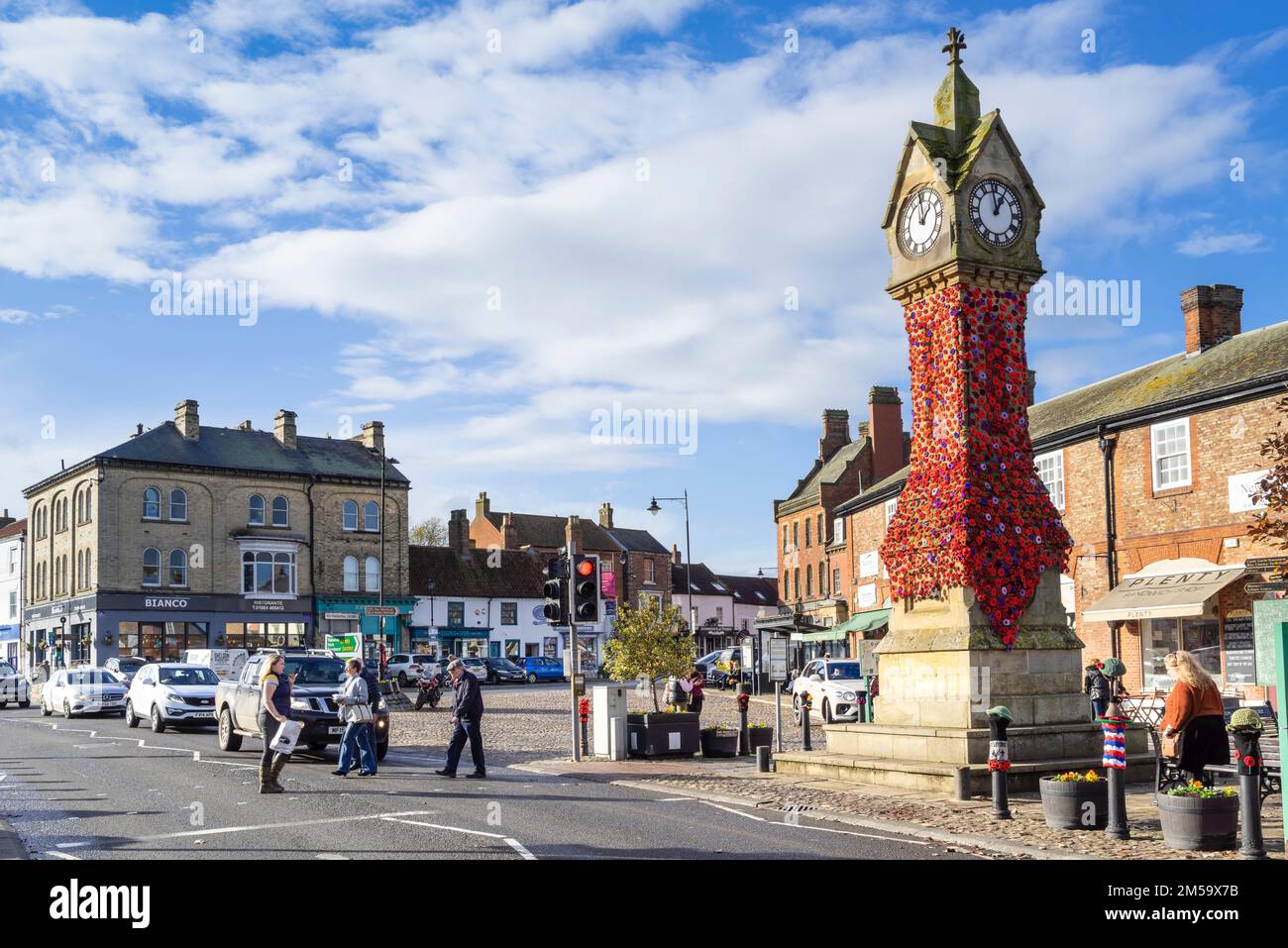 Thirsk North Yorkshire Thirsk Market Place Clock Tower Thirsk with yarn bombing thirsk North Yorkshire England UK GB Europe Stock Photo