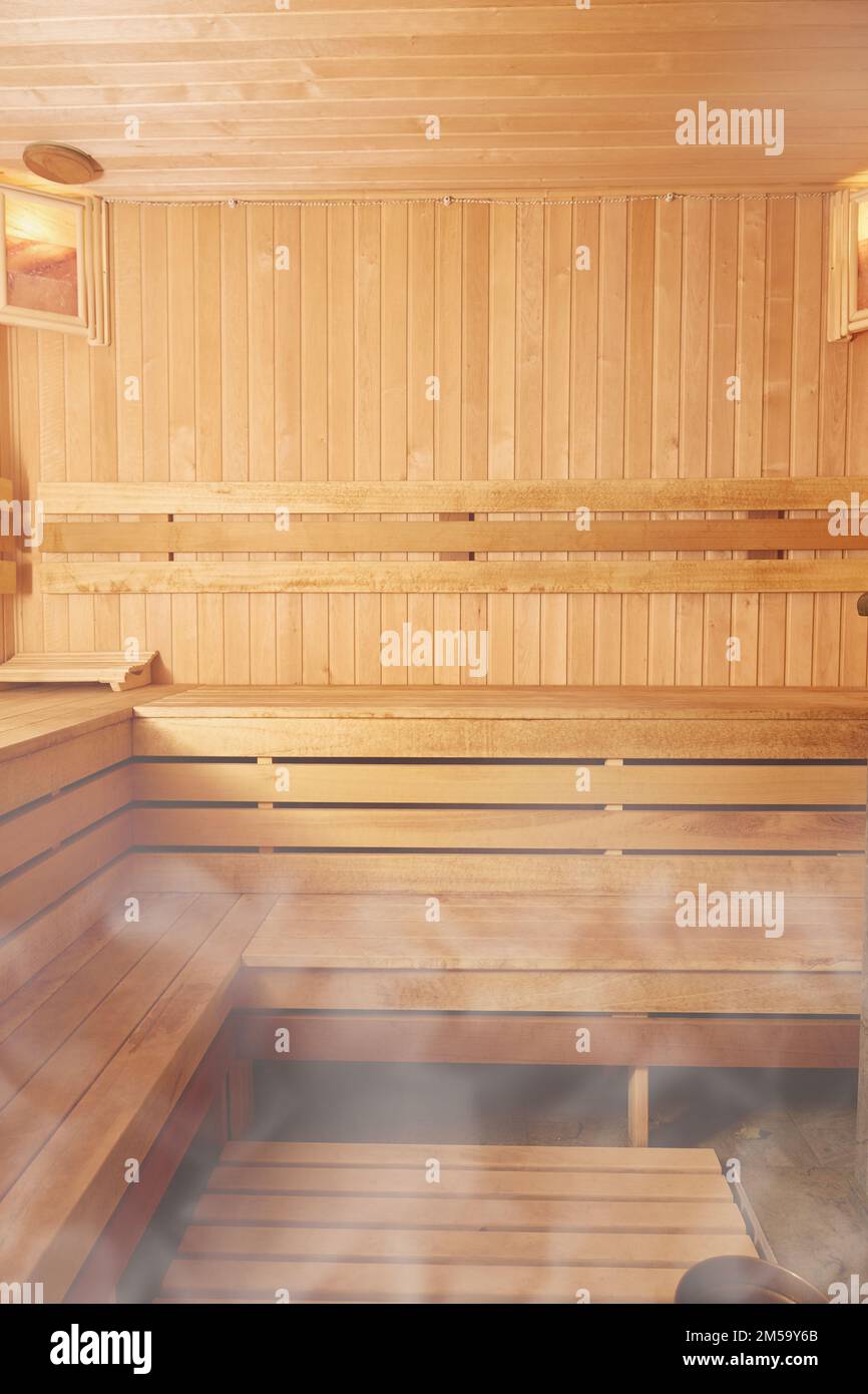Vertical photo of a wooden sauna. Copy space. Stock Photo