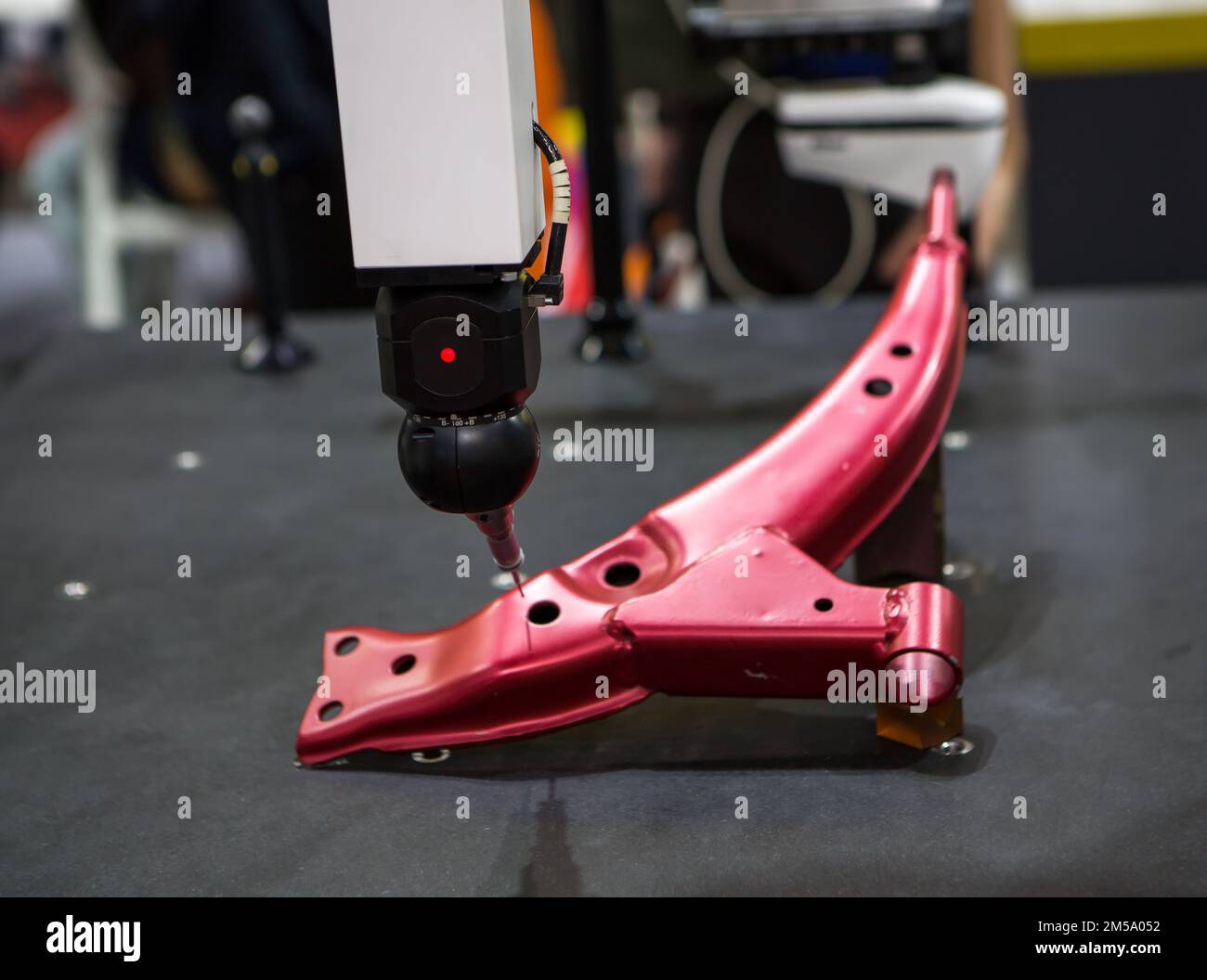 CMM Coordinate Measuring Machine probe measuring workpiece in