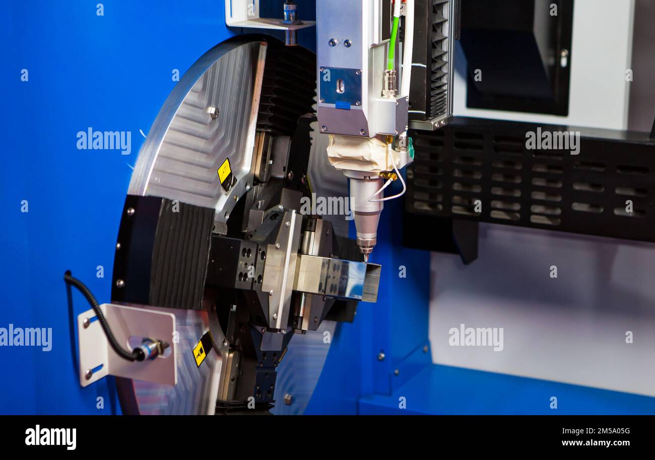 Pipe laser cutting machine. Industrial manufacture. Stock Photo