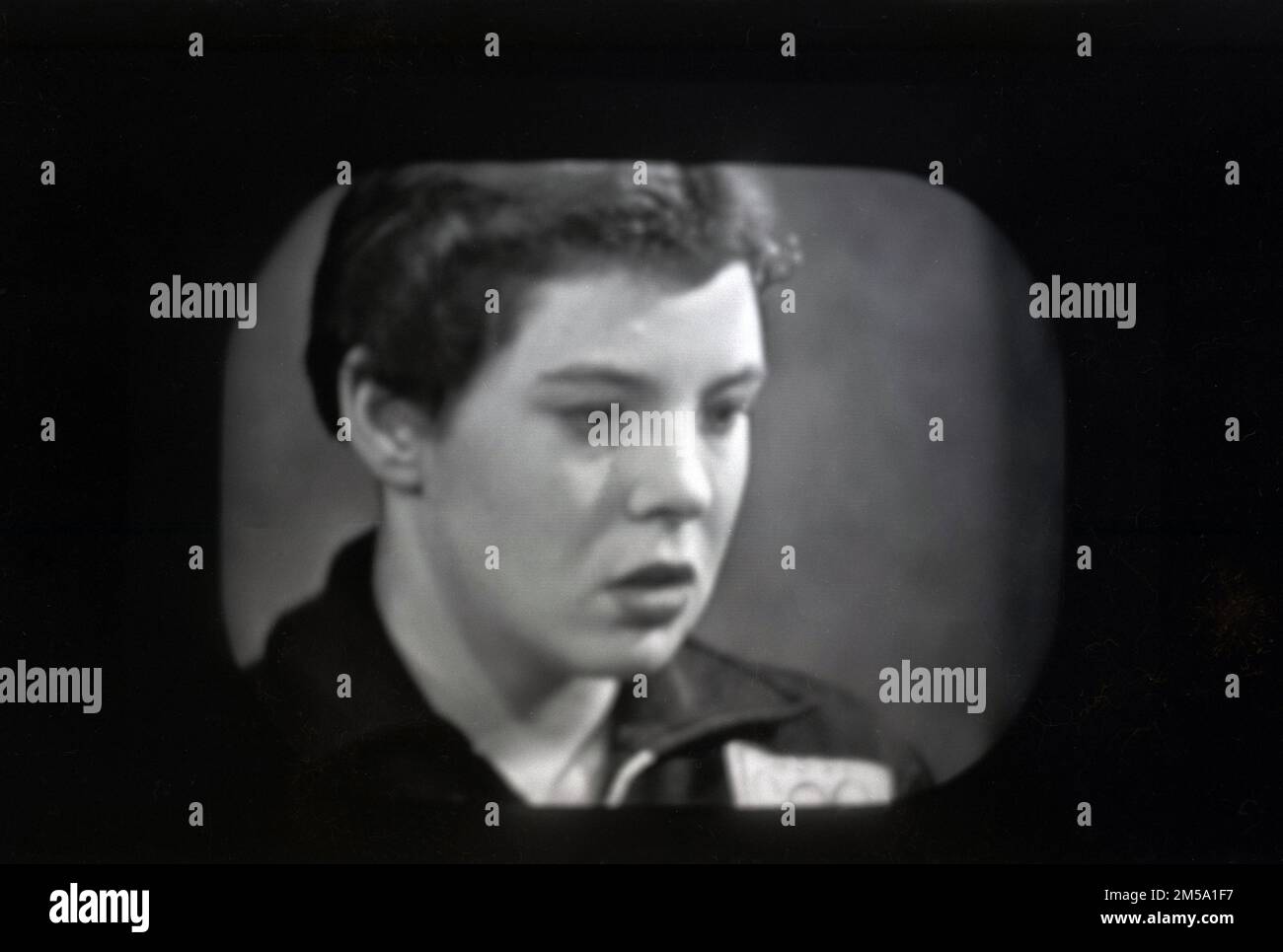 1950s, historical, the English swimmer Judy Grinham on televison. Grinham won the 100-metre backstroke at the 1956 Olympic Games, the first British swimmer to win a swimming gold medal since 1924. In 1958 she was the British Sportswoman of the year, having become the first woman in any sport to win Olympic, European and Commonwealth gold medals. Stock Photo
