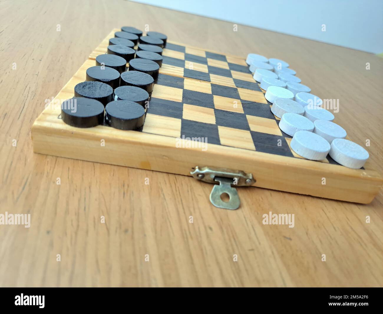 Checkerboard with checkers Business strategy planning. Plastic