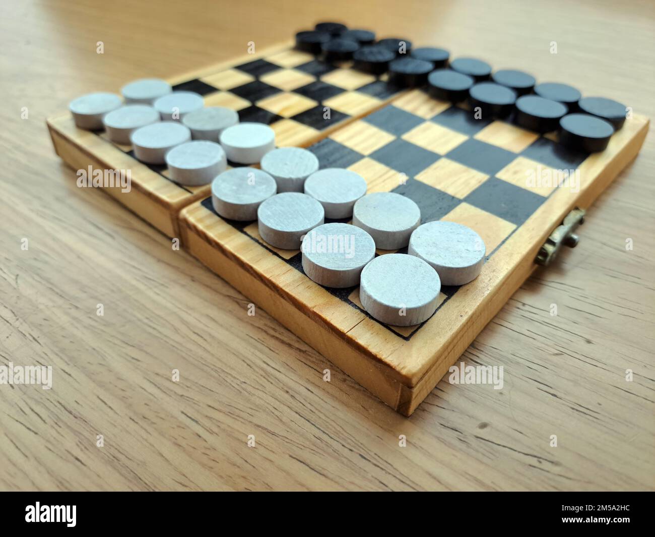 Checkerboard with checkers Business strategy planning. Plastic