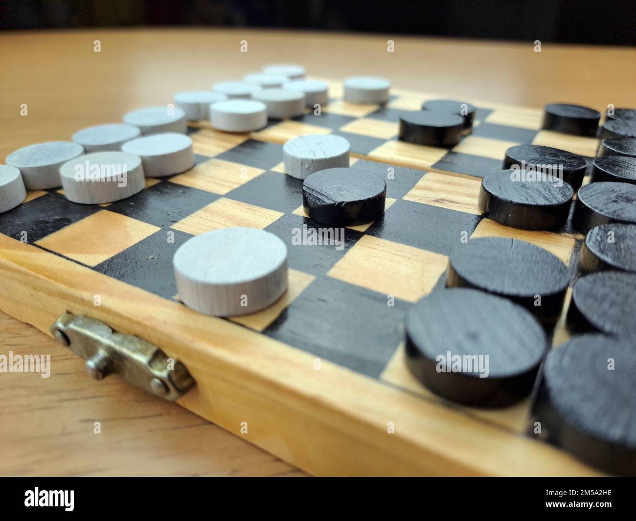 Checkerboard with checkers Business strategy planning. Plastic