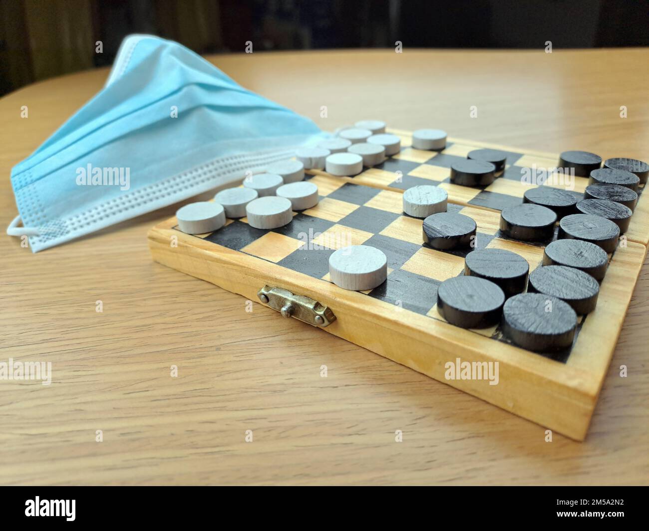 Checkerboard with checkers Business strategy planning. Plastic