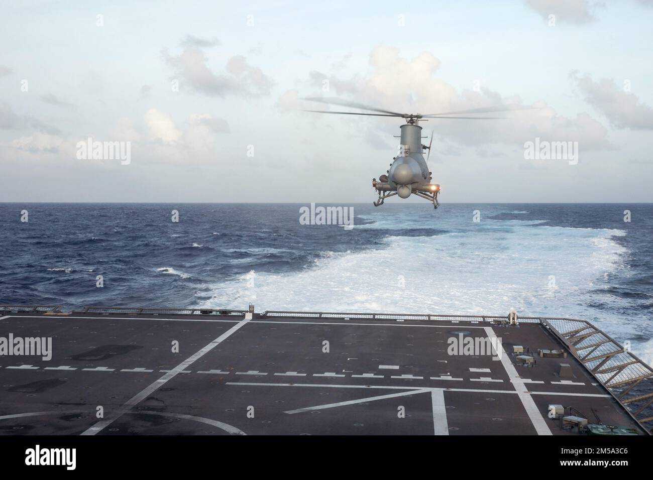 220214-N-LI768-1153  PHILIPPINE SEA (Feb. 14, 2022) – An MQ-8B Fire Scout lands on the flight deck of the Independence-variant littoral combat ship USS Tulsa (LCS 16). Tulsa, part of Destroyer Squadron (DESRON) 7, is on a rotational deployment, operating in the U.S. 7th Fleet area of operations to enhance interoperability with partners and serve as a ready-response force in support of a free and open Indo-Pacific region. Stock Photo
