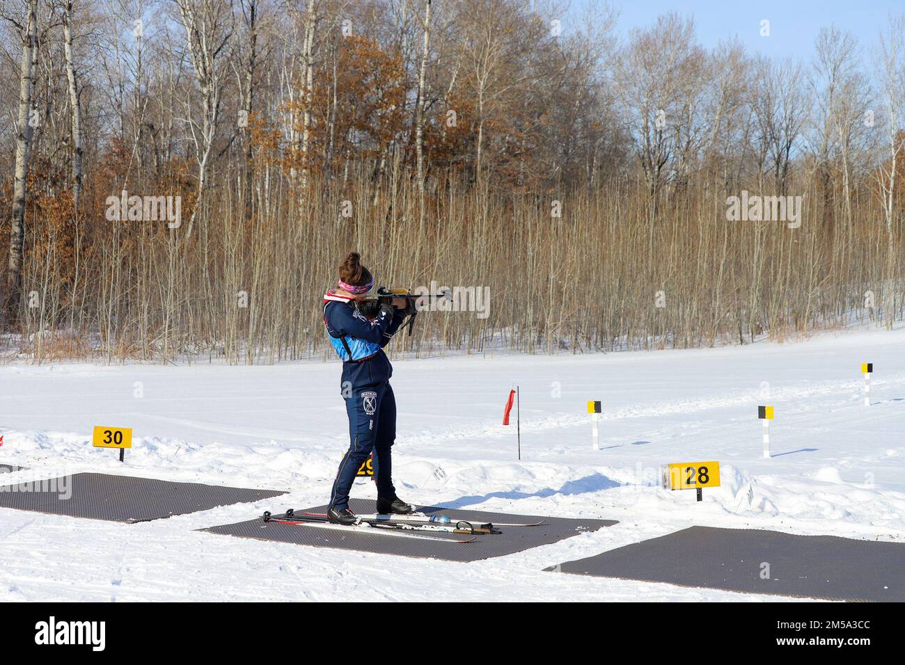 Virgin Islands Robin Saila aims a rifle at the firing line during the