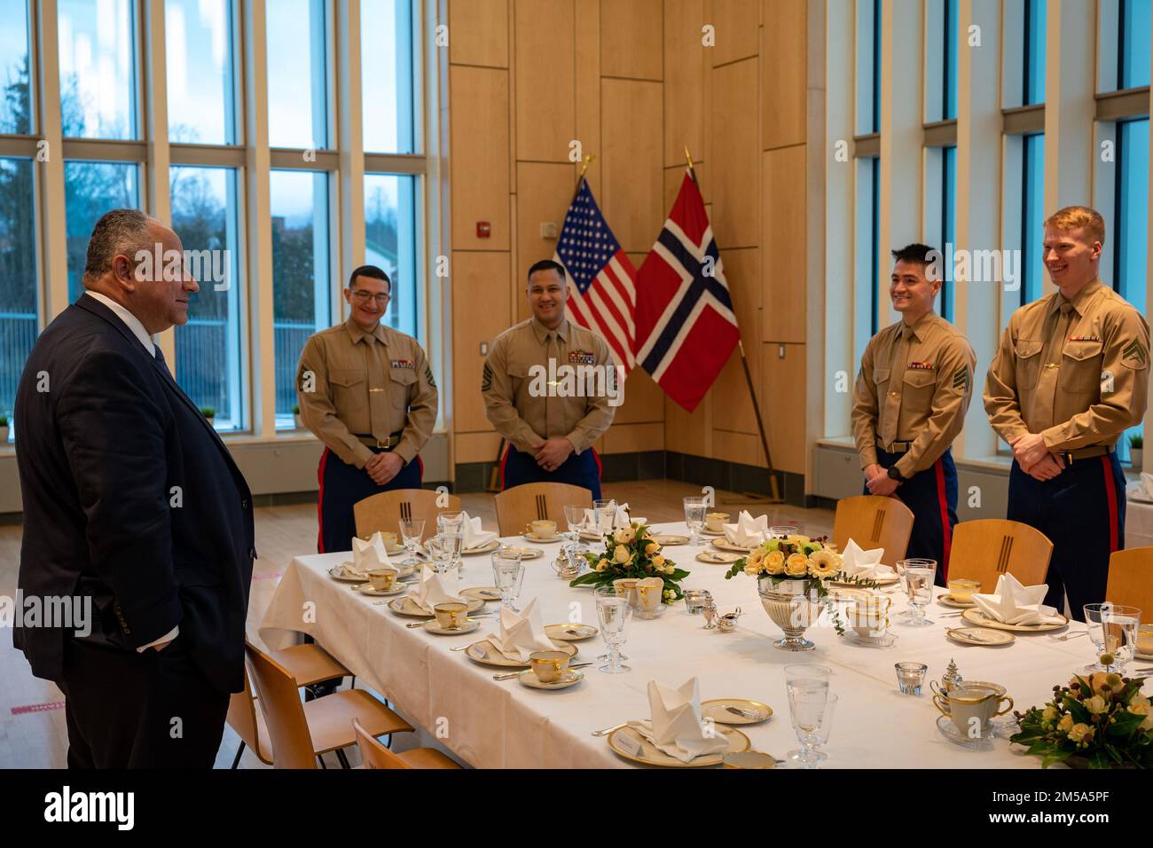 OSLO, Norway (Feb. 14, 2022) — Secretary of the Navy Carlos Del Toro speaks about his career in the U.S. Navy and his current role with U.S. Marines assigned to Marine Security Guard, Detachment Oslo in Oslo, Norway, Feb. 14, 2022. Secretary Del Toro is in Norway to visit U.S. service members and Norwegian government leaders to reinforce existing bilateral and multilateral security relationships between the U.S. Navy and the Royal Norwegian Navy. Stock Photo