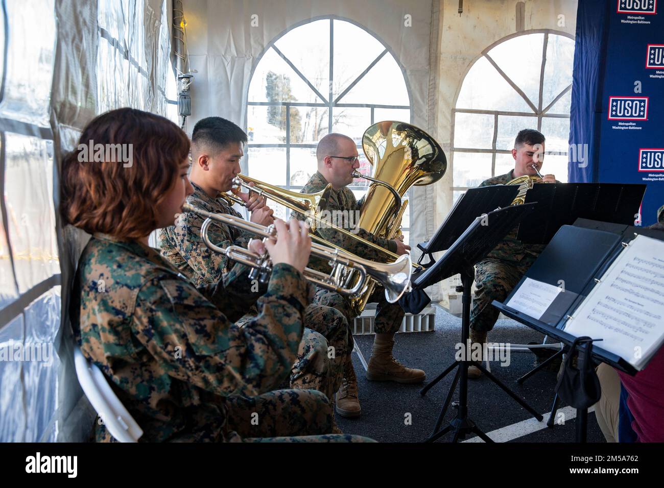 U.S. Marines with the Marine Corps Base Quantico band play the national anthem during the opening ceremony of the new United Service Organization Stock Photo