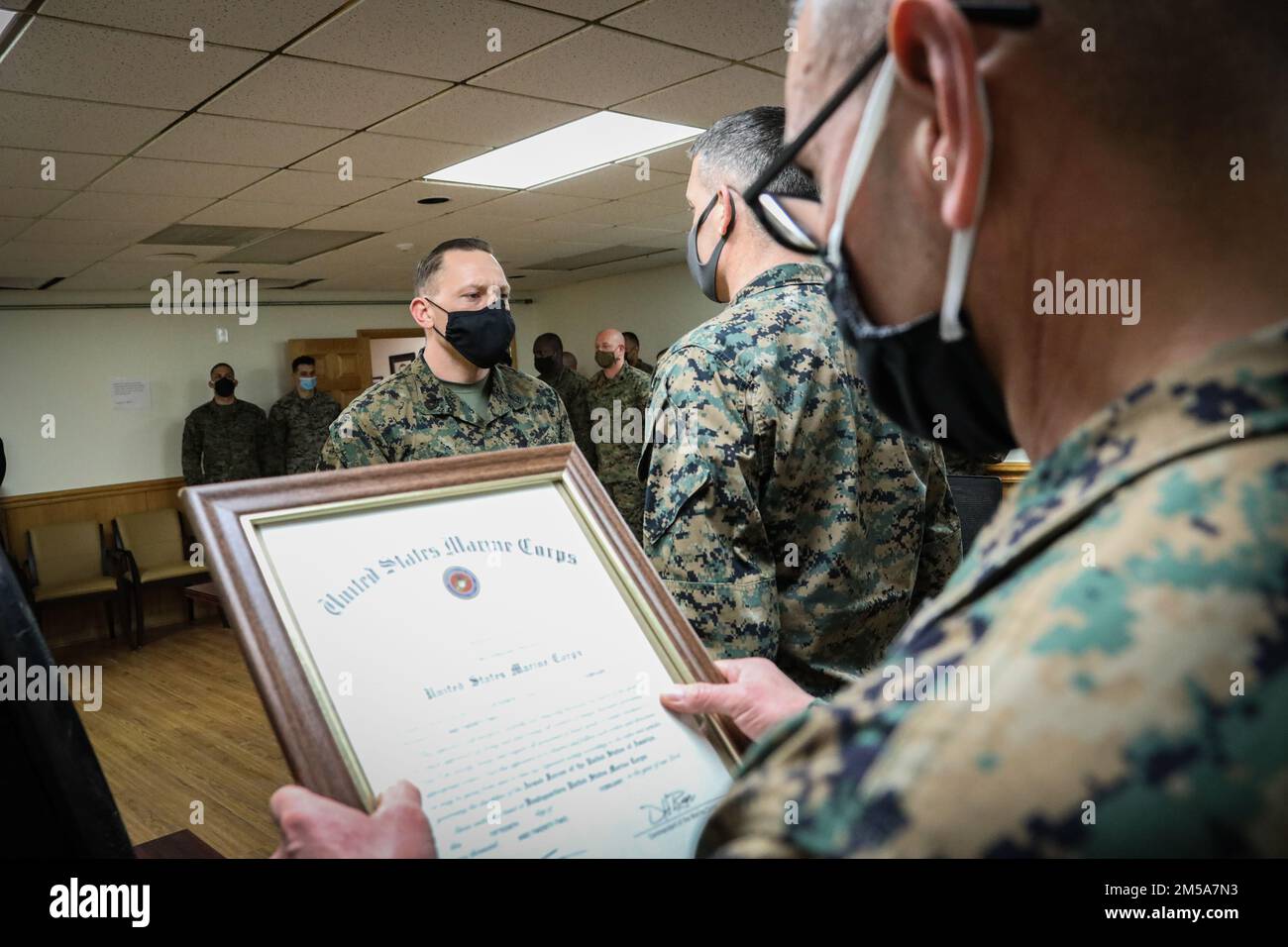 Indian Head, Md. (February 15, 2022) – United States Marine, Wadedale Keller, was pinned to the rank of First Sergeant aboard Naval Support Facility Indian Head, Md. on February 15, 2022. This promotion to First Sergeant from the rank of Gunnery Sergeant symbolizes the additional faith and confidence the Marine Corps is putting into 1st Sgt Keller. (Official U.S. Marine Corps photo by Gunnery Sgt. Kristian S. Karsten/Released) Stock Photo
