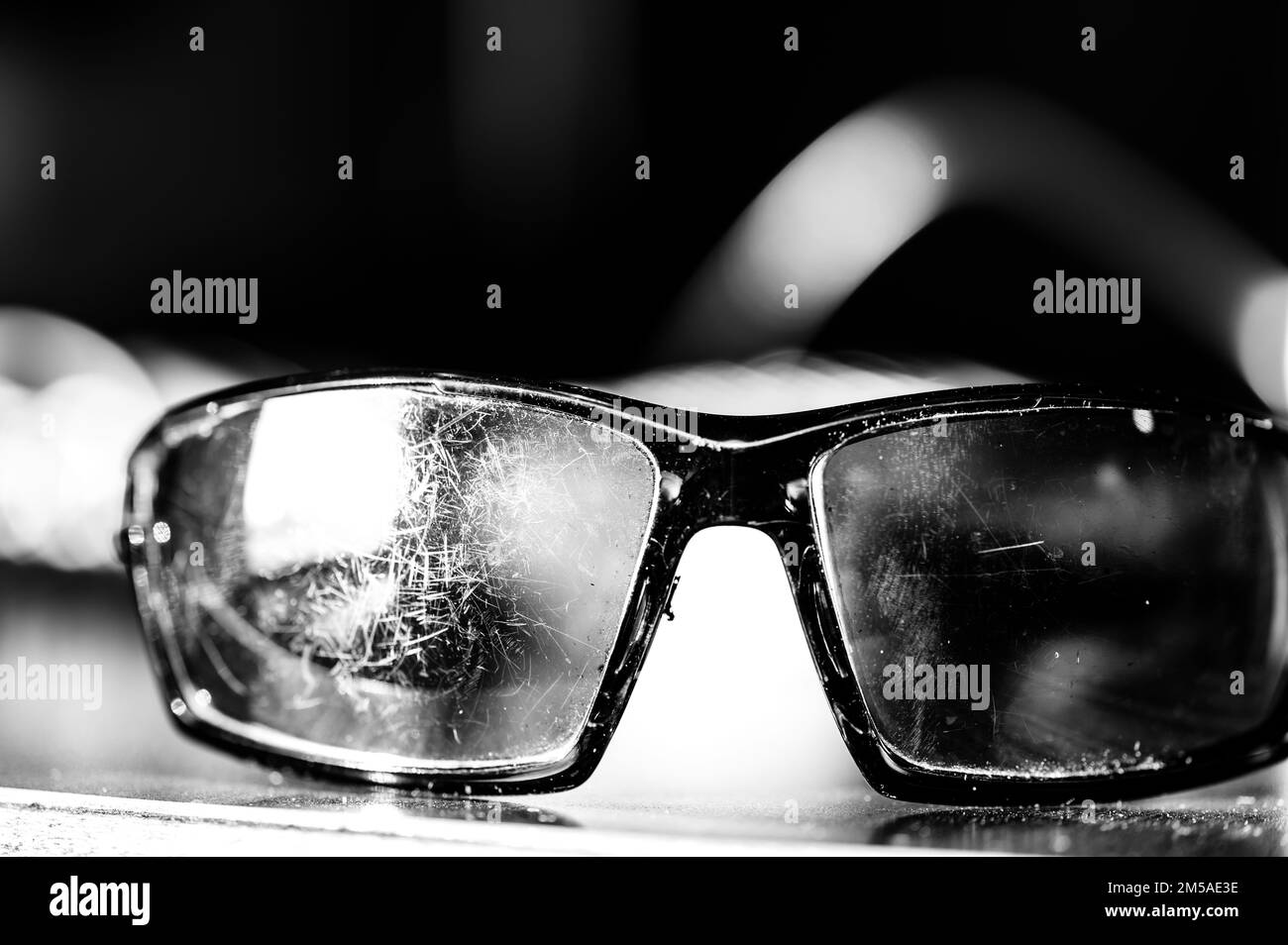 macro of the scratched surface of a polarized sunglasses lens Stock