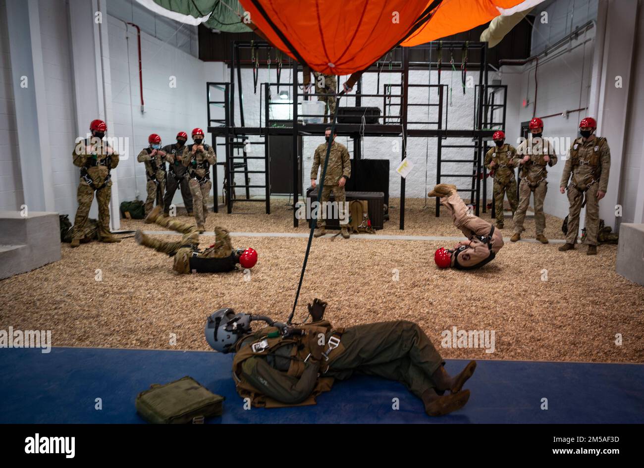 Air Commandos practice how to properly land on the ground after
