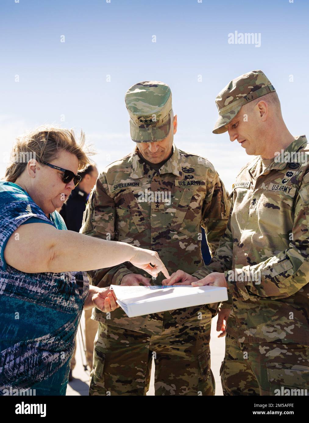 Lisa Metheney (left), Charleston District’s head civilian, and Lt. Col. Andrew Johannes (right), Charleston District commander, go over documents with Lt. Gen. Scott Spellmon, 55th chief of engineers and commanding general of the U.S. Army Corps of Engineers. Stock Photo