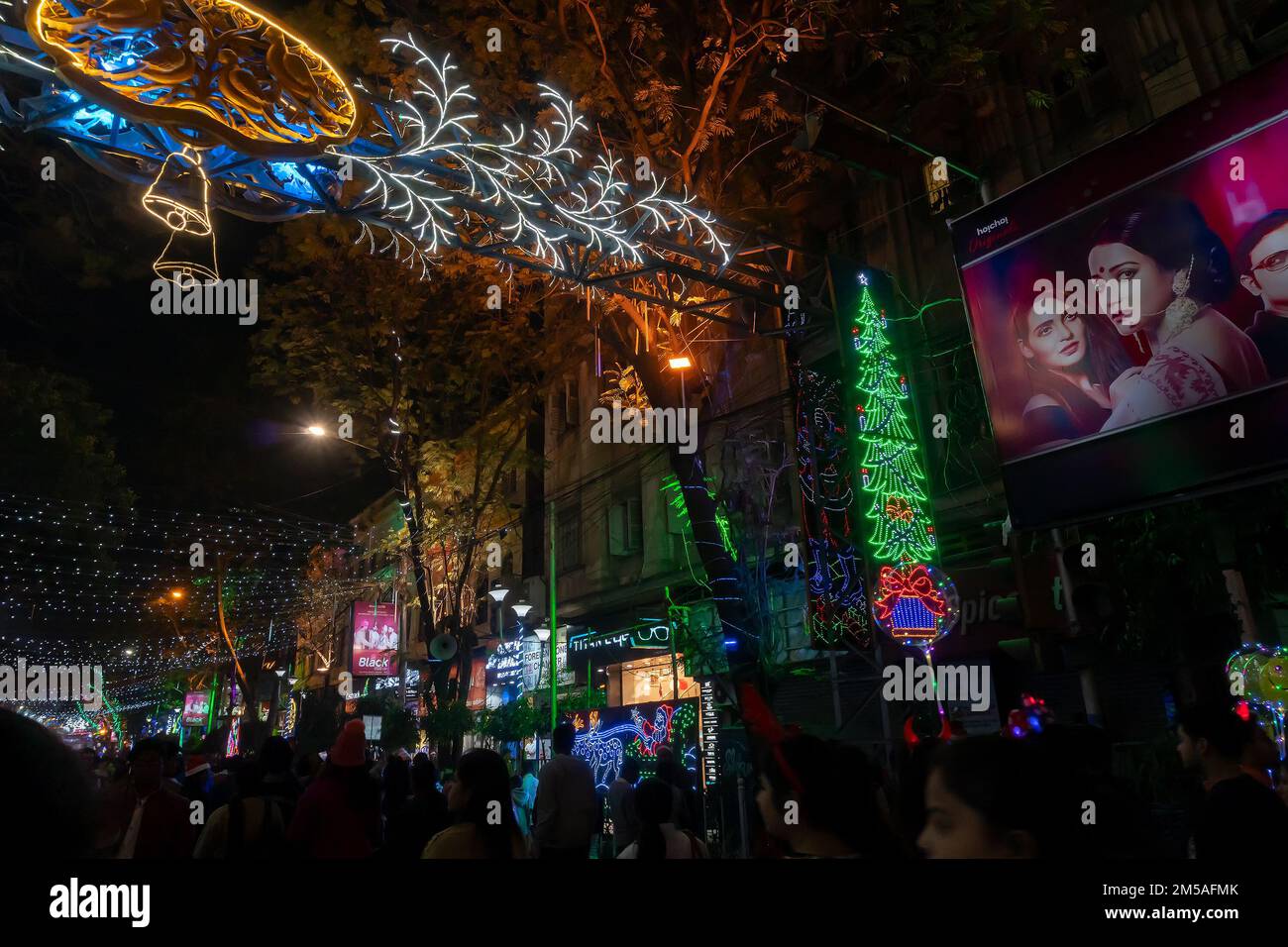 Kolkata, West Bengal, India - 25.12.2018 : Christmas celebration by enthusiastic young public at illuminated and decorated park street with lights. Stock Photo