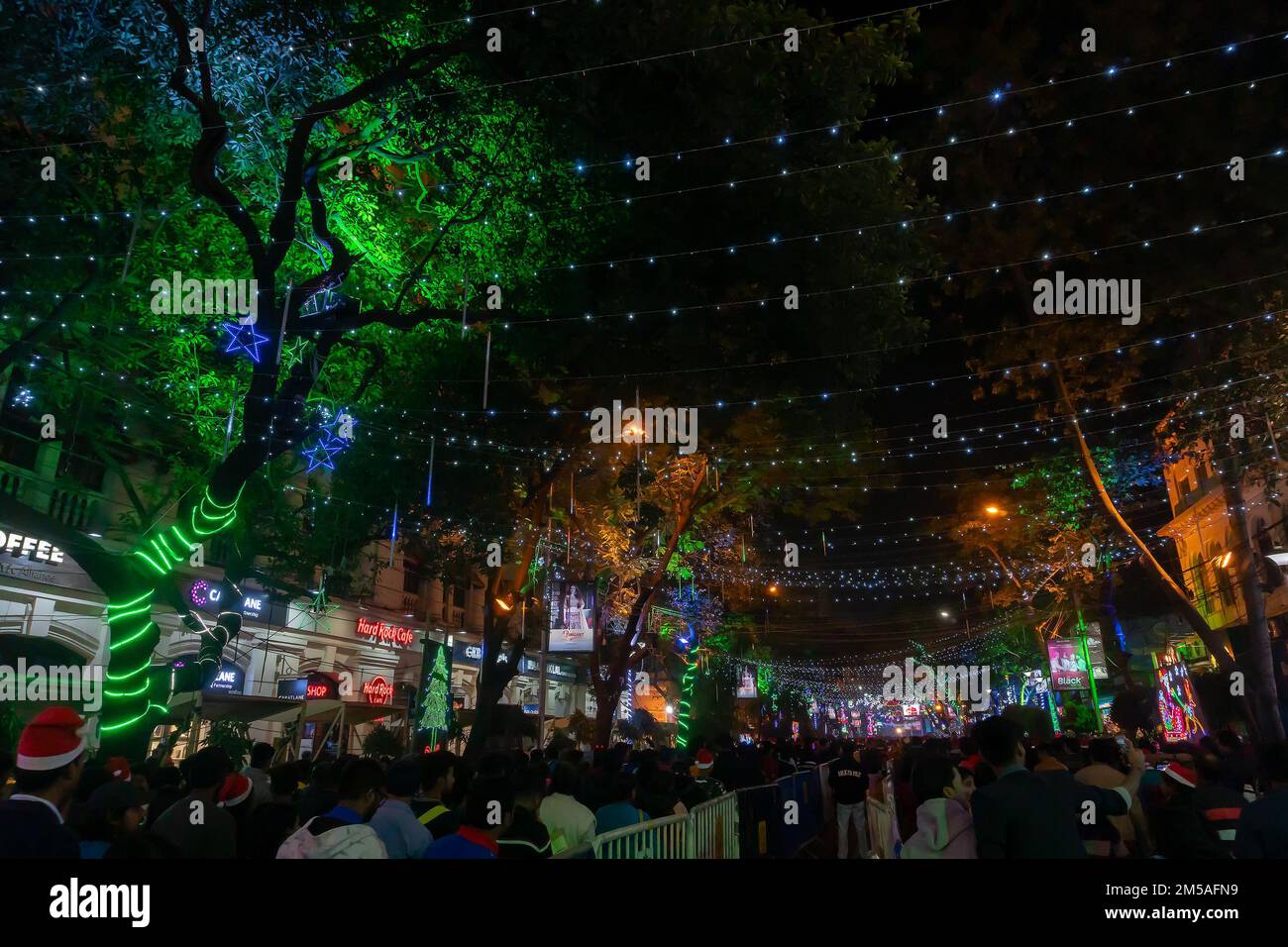 Kolkata, West Bengal, India - 25.12.2018 : Christmas celebration by enthusiastic young public at illuminated and decorated park street with lights. Stock Photo