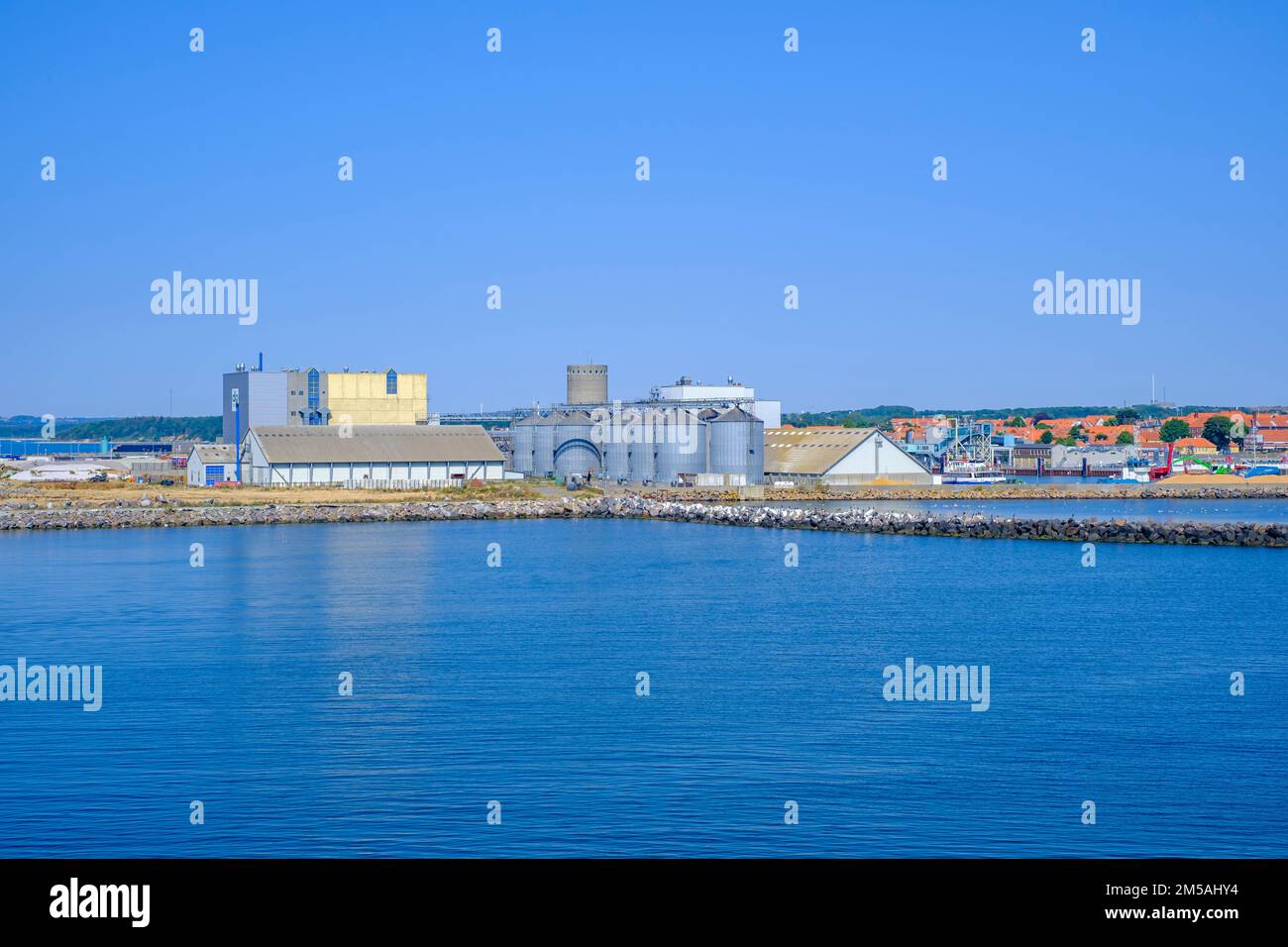 Industrial facility structures in the harbour entrance of Rönne, Bornholm island, Denmark, Scandinavia, Europe. Stock Photo