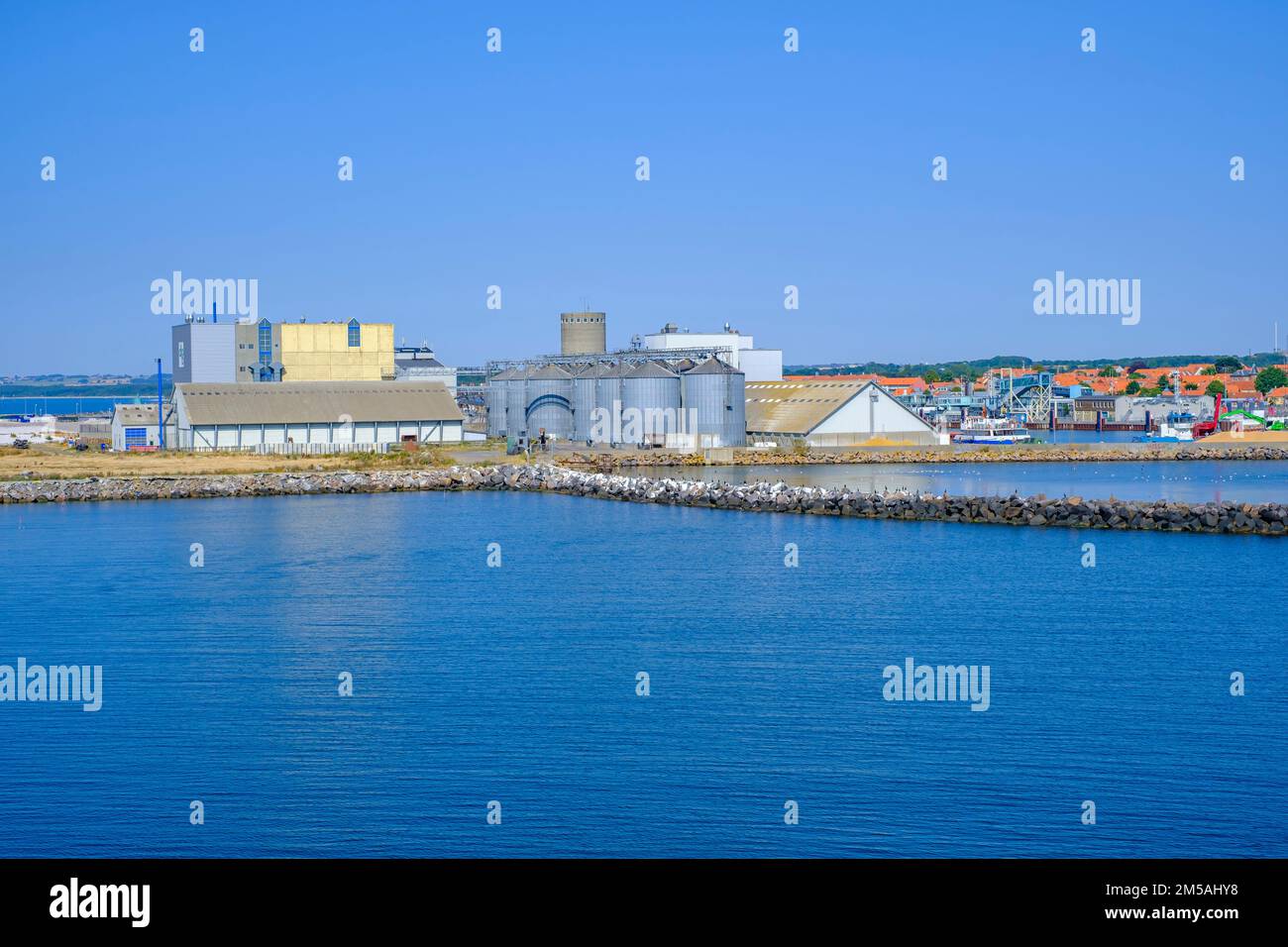 Industrial facility structures in the harbour entrance of Rönne, Bornholm island, Denmark, Scandinavia, Europe. Stock Photo