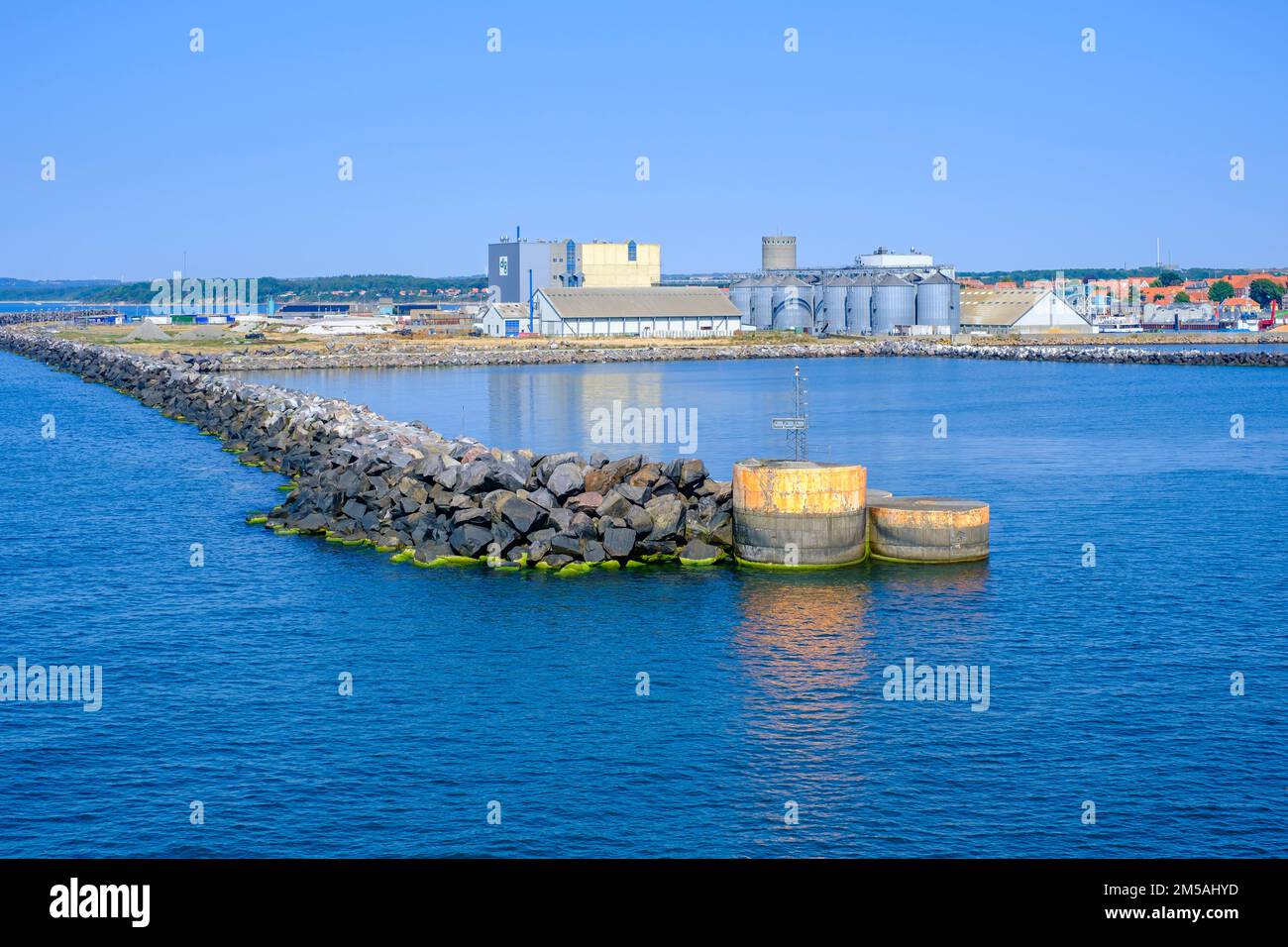 Industrial facility structures in the harbour entrance of Rönne, Bornholm island, Denmark, Scandinavia, Europe. Stock Photo