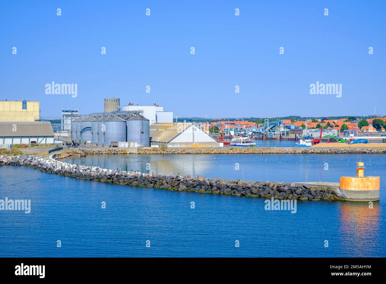 Industrial facility structures in the harbour entrance of Rönne, Bornholm island, Denmark, Scandinavia, Europe. Stock Photo