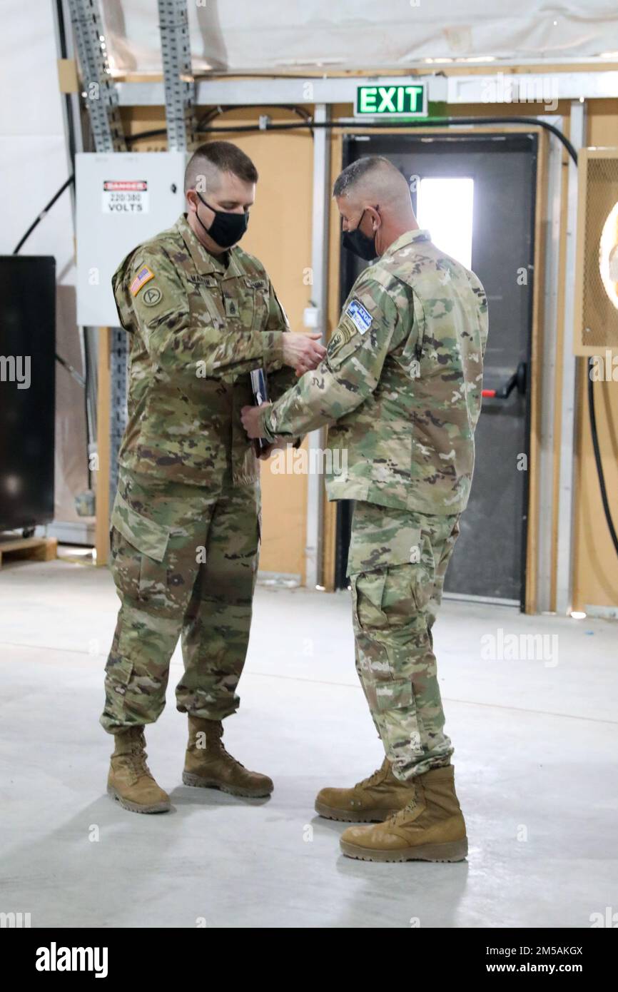 KFOR 29 Regional Command – East said goodbye to Aviation Task Force Valkyrie and welcomed the incoming Aviation Task Force Pegasus, part of KFOR 30, in a Transfer of Authority ceremony at Camp Bondsteel, Kosovo on February 16, 2022.     U.S. Army Photo by Sgt. Gillian McCreedy (OR-5) Stock Photo