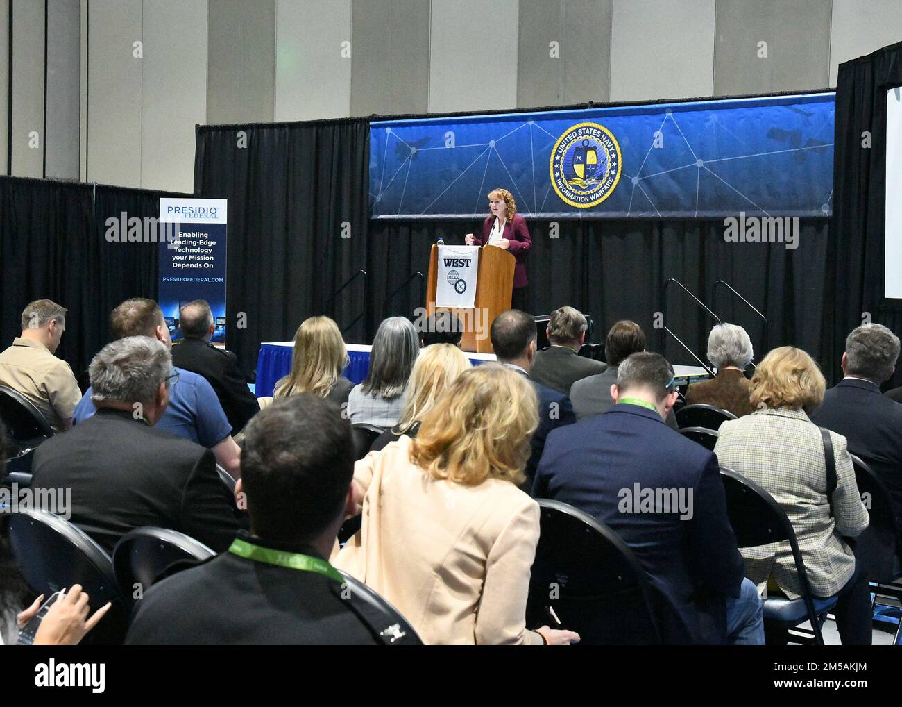Ms. Tami North, Director Naval Information Forces West opens the first ...