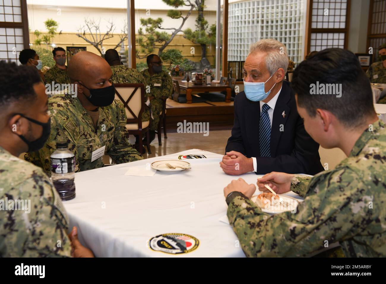 YOKOSUKA - 220217-N-ON904-1423 (Feb. 17, 2022) U.S. Ambassador to Japan, Rahm Emanuel, visits with U.S. Navy Sailors from Chicago at the base galley aboard Commander, Fleet Activities Yokosuka.  Emanuel is visiting Yokosuka to mark the importance of the bilateral partnership between the U.S. and Japan. Stock Photo