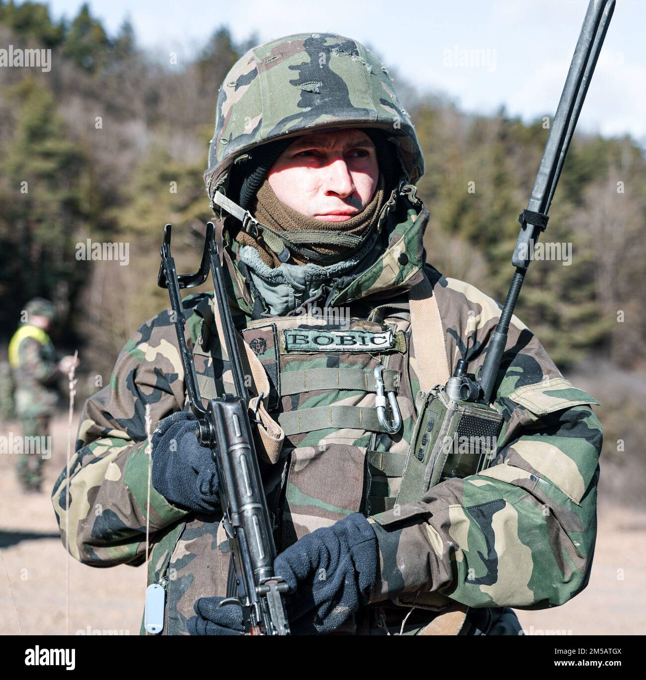 A Moldavian soldier conducts a joint patrol during KFOR 30 at the Hohenfels Training Area in Germany, Feb. 17, 2022. KFOR 30 is a multinational training event conducted to prepare units for their deployment to the Kosovo Regional Command East. Stock Photo