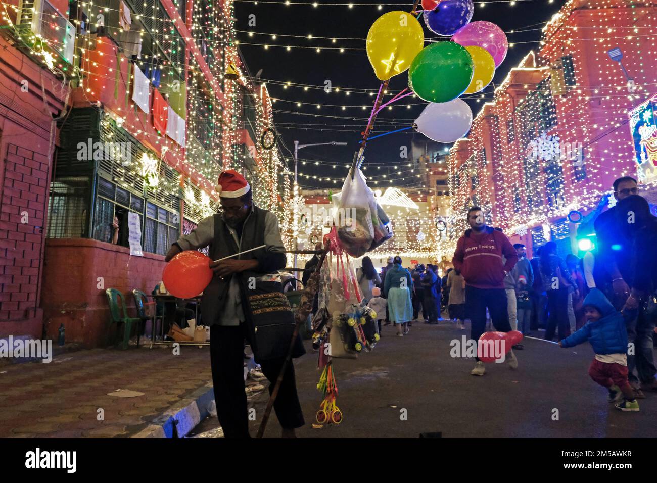 Kolkata, India. 24th Dec, 2022. Christmas evening is celebrated at Bow Barrack. Numerous events are being taken place. Hundreds of people are gathered here for Christmas evening in Kolkata, India on Dec. 24, 2022. (Photo by Swattik Jana/Pacific Press/Sipa USA) Credit: Sipa USA/Alamy Live News Stock Photo