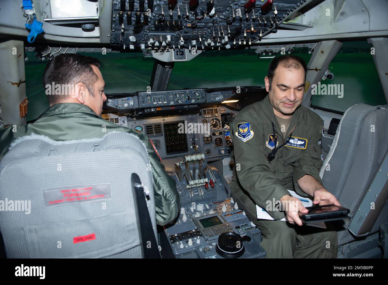 Maj. Jon Grossrhode (left), an E4B pilot from the 1st Airborne Command