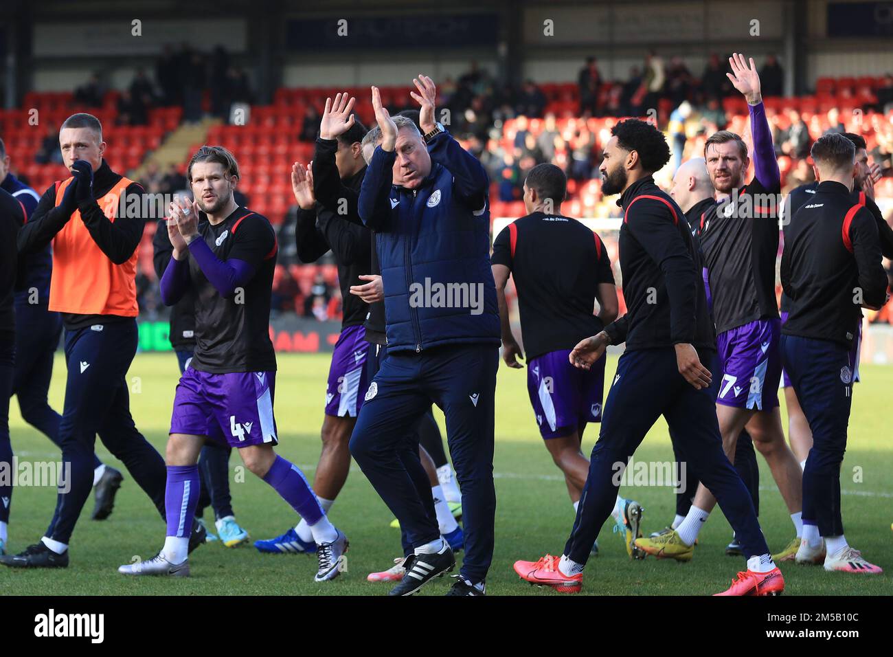 London, UK. 27th Dec, 2022. Stevenage assistant manager Paul Rayner applauds fans during the EFL Sky Bet League 2 match between Leyton Orient and Stevenage at the Matchroom Stadium, London, England on 27 December 2022. Photo by Carlton Myrie. Editorial use only, license required for commercial use. No use in betting, games or a single club/league/player publications. Credit: UK Sports Pics Ltd/Alamy Live News Stock Photo