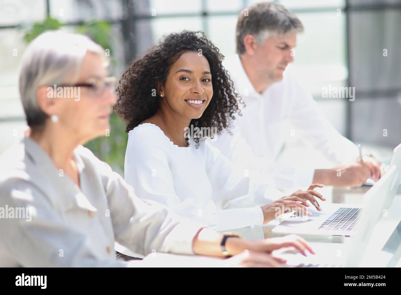business woman in the office at work with the team Stock Photo Alamy