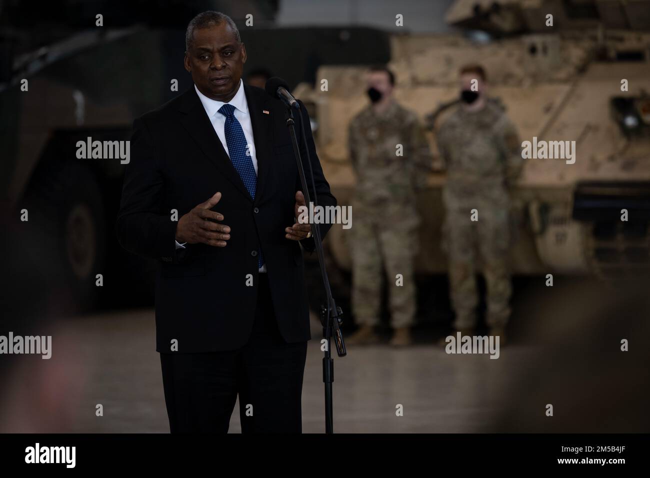 Secretary of Defense Lloyd J. Austin III addresses U.S. and Polish troops at Powidz Air Base, Poland, Feb. 18, 2022. Austin was in Poland to meet with Polish leadership and to tour the Powidz facilities and observe the culture and conditions of our rotational presence there. After visiting Poland Austin will continue on to Lithuania where he will talk with leaders of the Baltic states and will visit with U.S. Service members stationed in Lithuania. Stock Photo