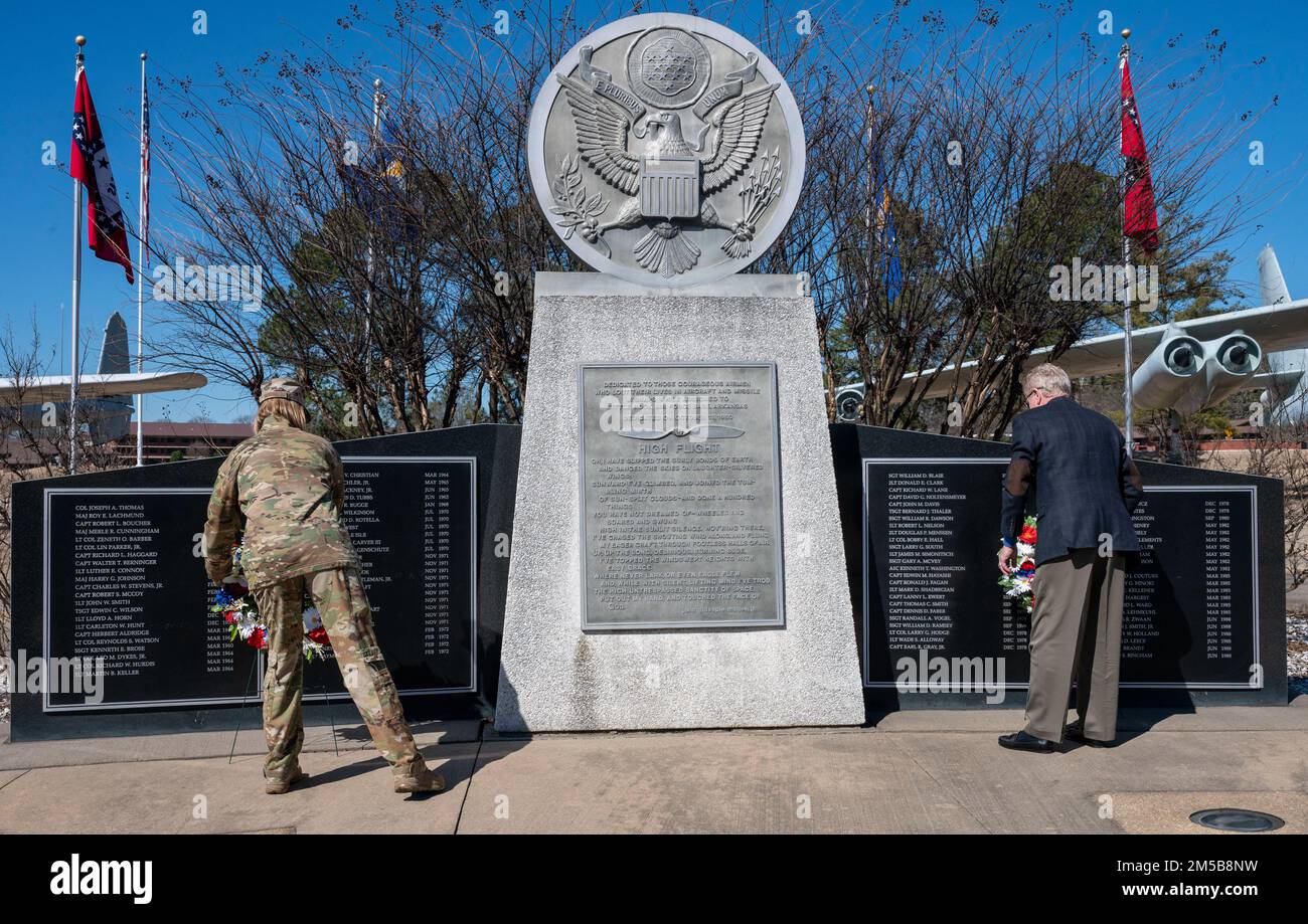 U.S. Air Force Col. Angela Ochoa, 19th Airlift Wing commander, and Jim  Breen, brother of Capt. Edward Breen, lay wreaths during a ceremony at  Little Rock Air Force Base, Arkansas, Feb. 18,