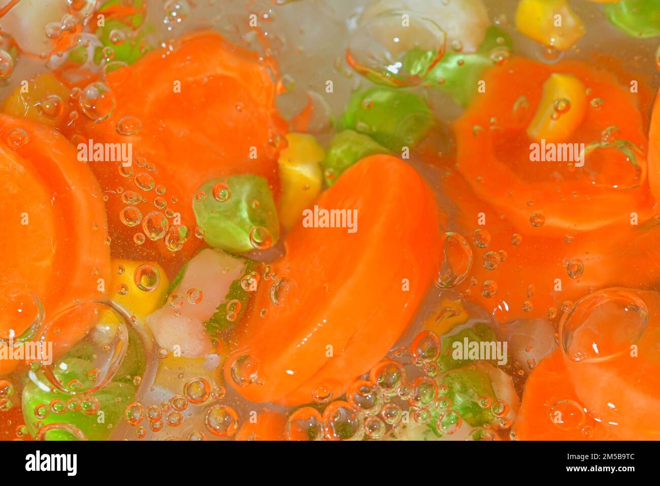 Closeup view of the vegetables with carrots, peas, cauliflower and