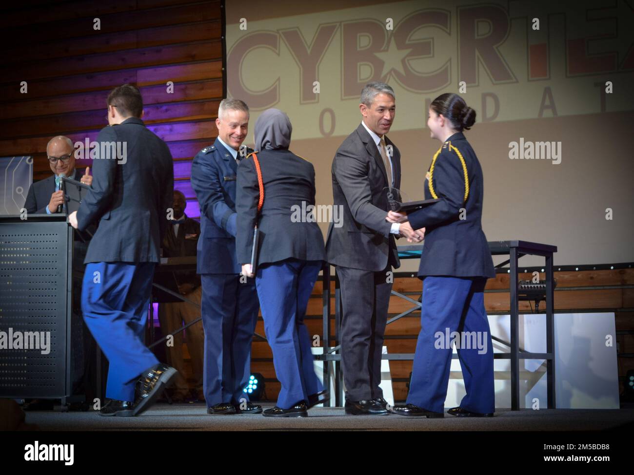 Lt. Gen. Timothy Haugh, 16th Air Force (Air Forces Cyber) commander, and Mayor Ron Nierenberg of San Antonio, congratulated winners of the San Antonio Mayor’s Cyber Cup during the annual event in San Antonio, Texas, Feb. 19. 16th Air Force Airmen  talked with students about the importance of cyber and intel operations during the college fair while others volunteered as mentors for the CyberPatriot program. Stock Photo