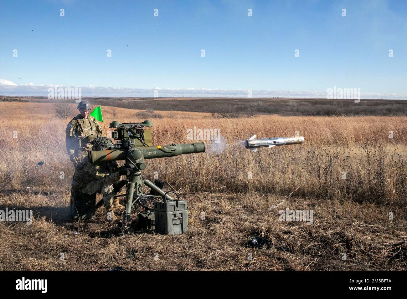 Soldiers with the Nebraska Army National Guard 1-134th Cavalry Squadron and 2-134th Infantry Battalion operate a TOW Missile System during a training exercise at Fort Riley, Kansas, Dec. 13, 2022. The unit was given 32 missiles and each Soldier was able to shoot at least twice. (U.S. Army National Guard photo by Sgt. Gauret Stearns) Stock Photo