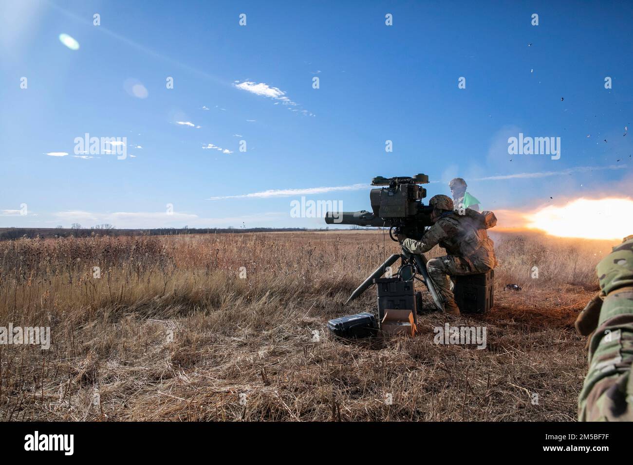 Soldiers with the Nebraska Army National Guard 1-134th Cavalry Squadron and 2-134th Infantry Battalion operate a TOW Missile System during a training exercise at Fort Riley, Kansas, Dec. 13, 2022. The unit was given 32 missiles and each Soldier was able to shoot at least twice. (U.S. Army National Guard photo by Sgt. Gauret Stearns) Stock Photo